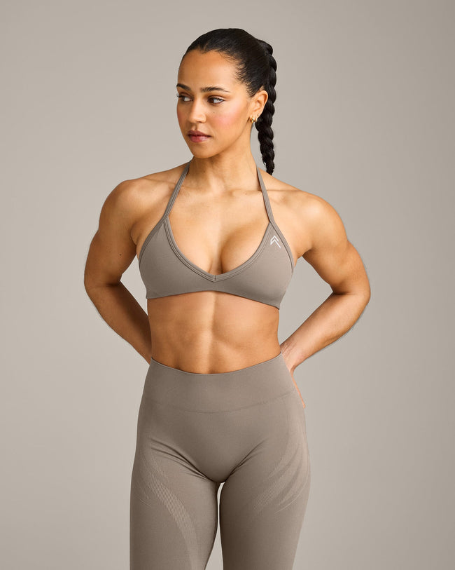 EnhanceLift™ Seamless Minimal Halter Neck Bralette with Grey Logo | Warm Minky