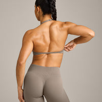 EnhanceLift™ Seamless Minimal Halter Neck Bralette with Grey Logo | Warm Minky