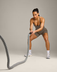 EnhanceLift™ Seamless Strappy Racer Vest with Built in Bra Shelf with Grey Logo | Warm Minky