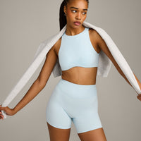 SoftMotion™ High Neck Sports Bra with Grey Logo |  Cloud Blue