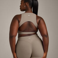 SoftMotion™ High Neck Sports Bra with Grey Logo | Minky