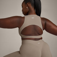 SoftMotion™ High Neck Sports Bra with Grey Logo | Minky