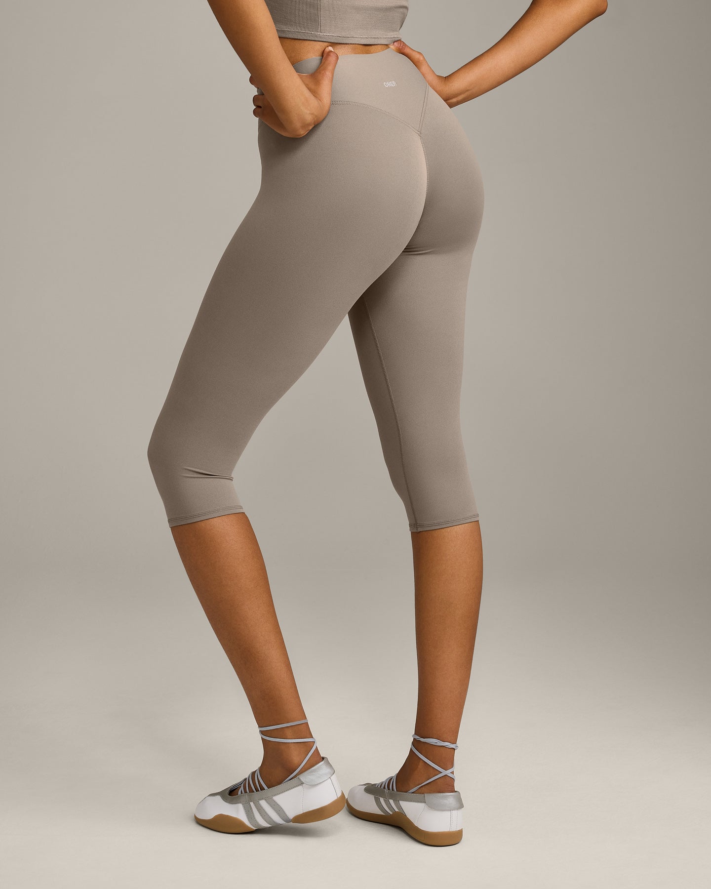 SoftMotion™ High Waisted Capri Leggings with Grey Logo | Minky