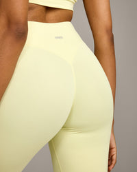 SoftMotion™ High Waisted Capri Leggings with Grey Logo | Pastel Yellow