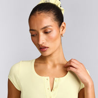 SoftMotion™ Scrunchie with Gray Logo | Pastel Yellow