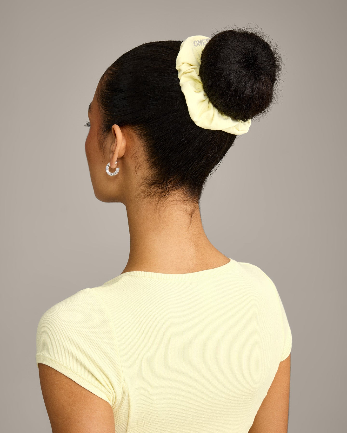SoftMotion™ Scrunchie with Grey Logo | Pastel Yellow