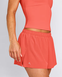 AirMove™ Lined Shorts 2" with Pocket New Branding | Light Charged Coral