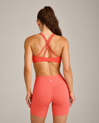 EasyLift™ High Neck Sports Bra with Grey Logo | Hyper Orange