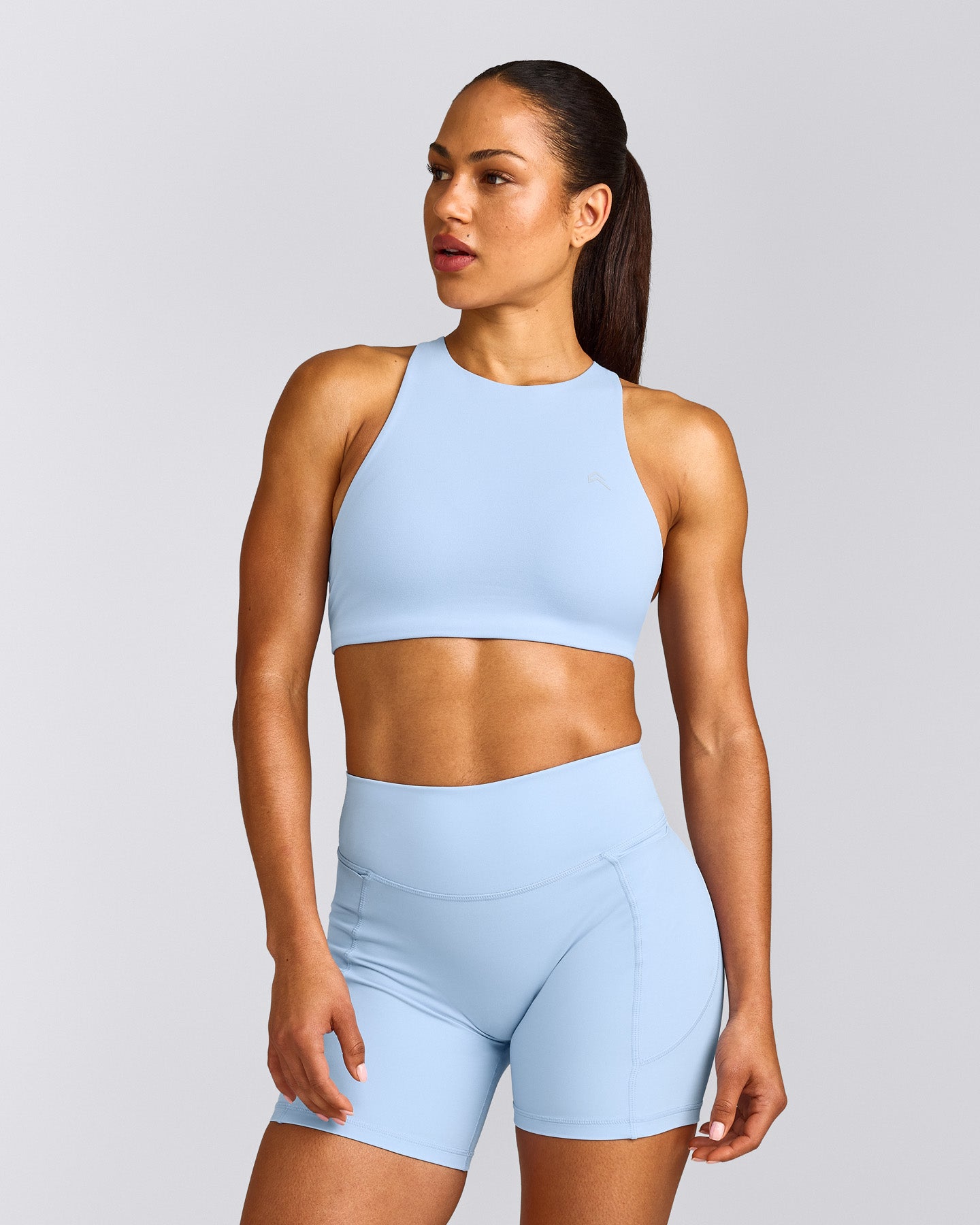 EasyLift™ High Neck Sports Bra with Grey Logo | Powdered Blue