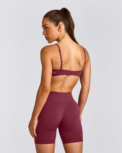 EnhanceLift™ Seamless Minimal Bralette with Grey Logo | Burnt Maroon Red