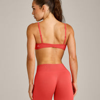 EnhanceLift™ Seamless Minimal Bralette with Grey Logo | Dark Charged Coral
