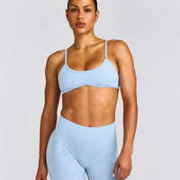 EnhanceLift™ Seamless Minimal Bralette with Grey Logo | Powdered Blue