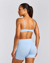 EnhanceLift™ Seamless Minimal Bralette with Grey Logo | Powdered Blue