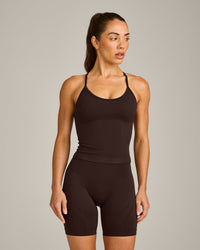EnhanceLift™ Seamless Strappy Racer Vest with Built in Bra Shelf with Grey Logo | 70% Cocoa