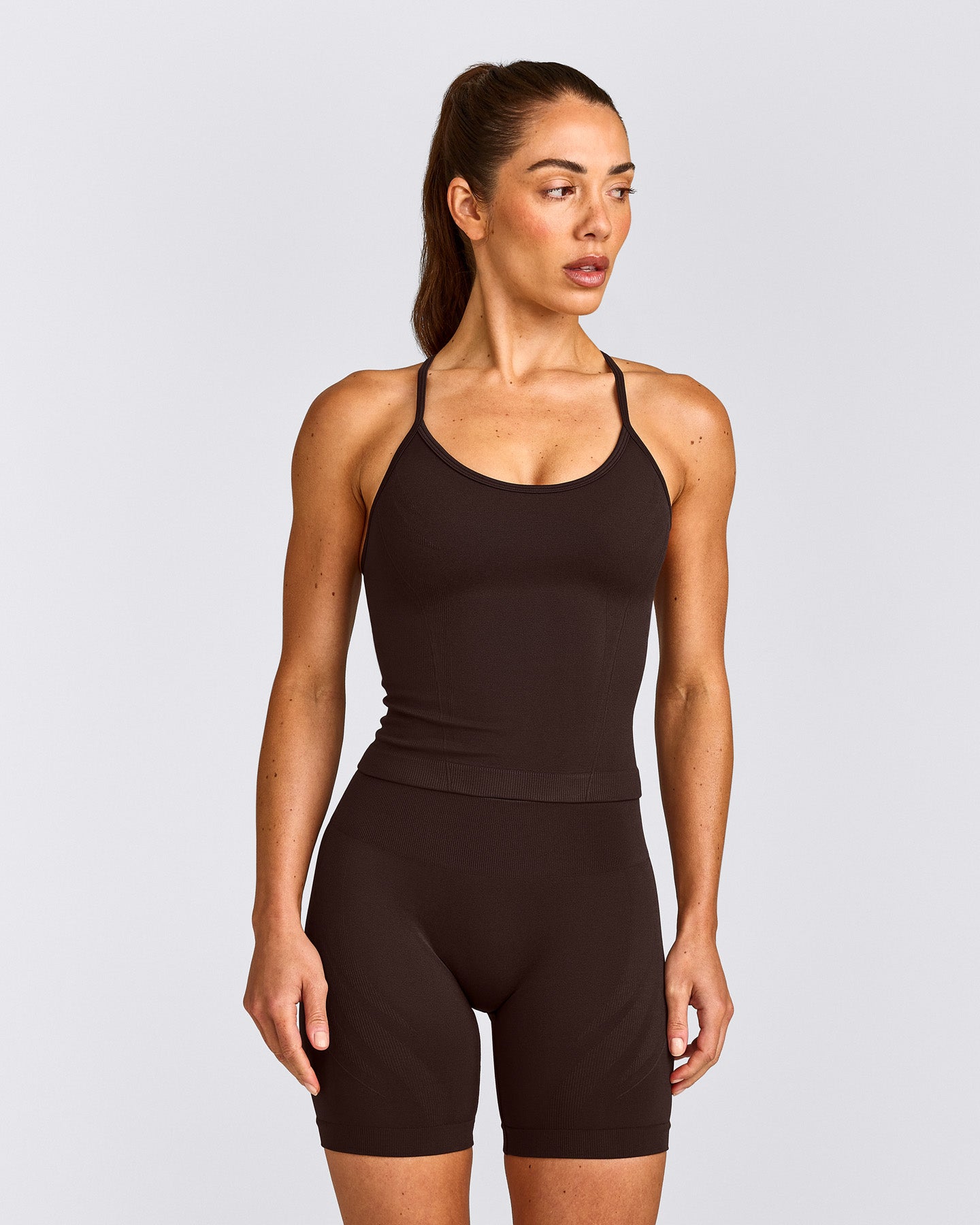 EnhanceLift™ Seamless Strappy Racer Vest with Built in Bra Shelf with Grey Logo | 70% Cocoa