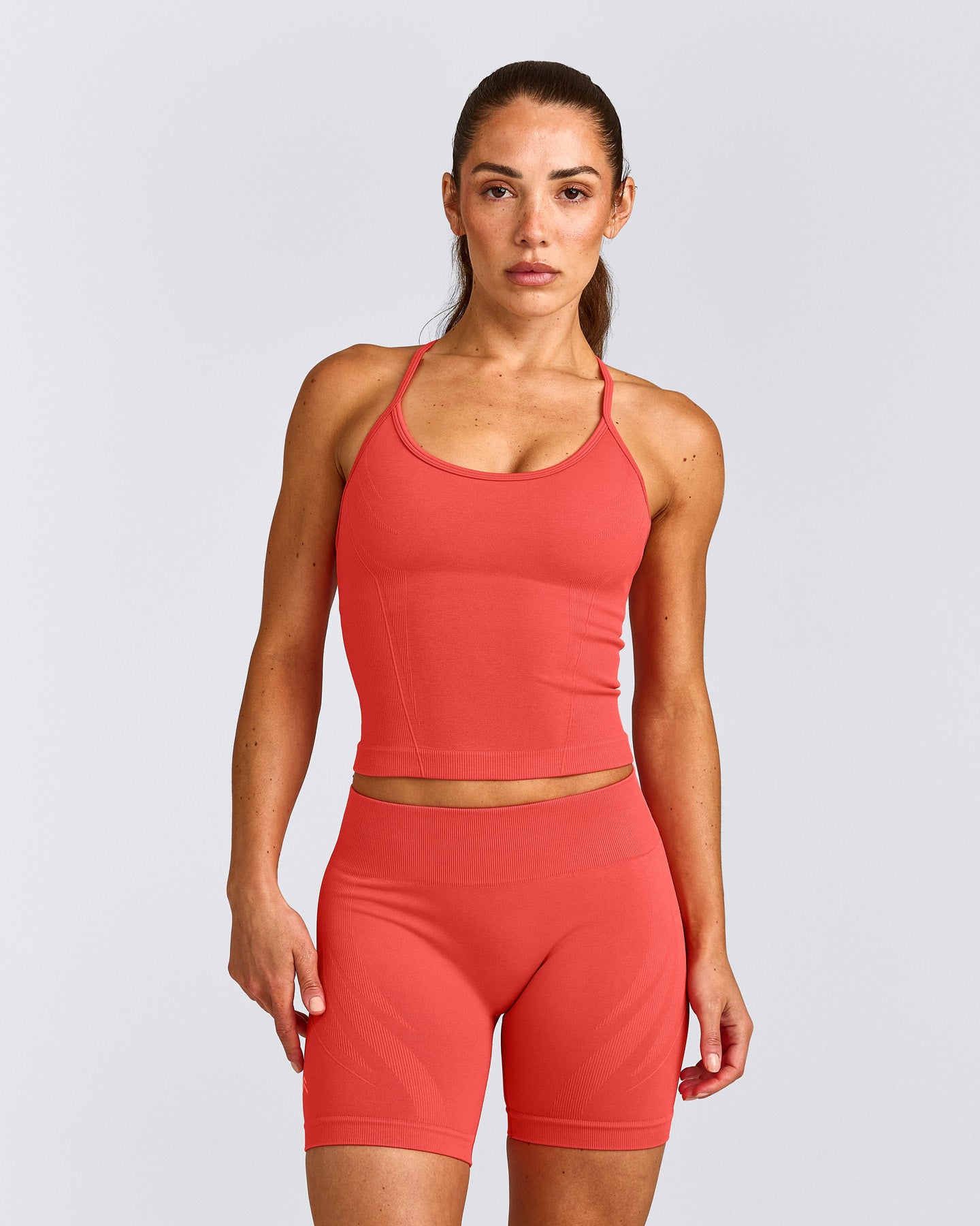 EnhanceLift™ Seamless Strappy Racer Tank Top with Built in Bra Shelf | Dark Charged Coral