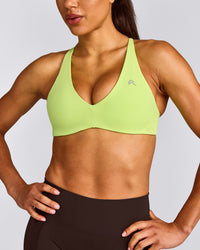 UnifiedMove™ Cross Back Sports Bra with Reflective Logo | Citrus Green