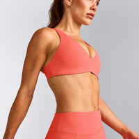 UnifiedMove™ Cross Back Sports Bra with Reflective Logo | Light Charged Coral