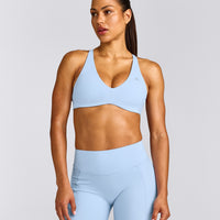 UnifiedMove™ Cross Back Sports Bra with Reflective Logo | Powdered Blue