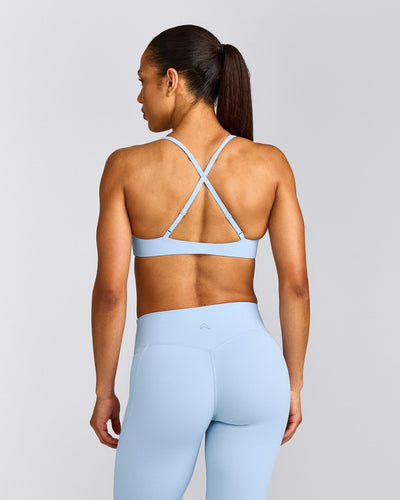 UnifiedMove™ Cross Back Sports Bra with Reflective Logo | Powdered Blue