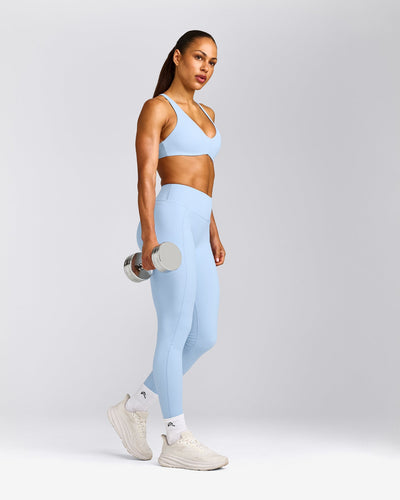 UnifiedMove™ Cross Back Sports Bra with Reflective Logo | Powdered Blue