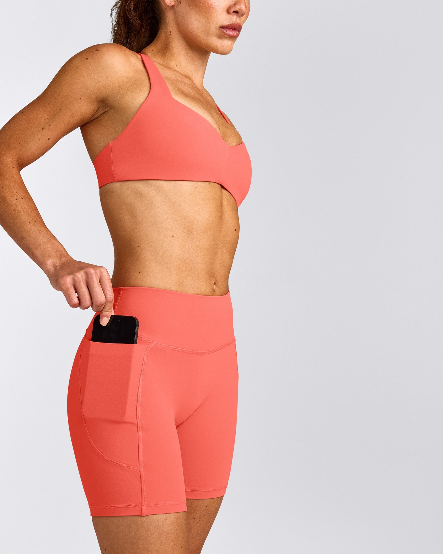 UnifiedMove™ Pocket Shorts 6" with Bonding with Reflective Logo | Light Charged Coral