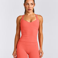 UnifiedMove™ T Back Mid Vest with Built in Bra Shelf with Reflective Logo | Light Charged Coral