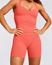 UnifiedMove™ T Back Mid Vest with Built in Bra Shelf with Reflective Logo | Light Charged Coral