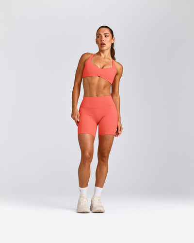 UnifiedMove™ T Back Minimal Bralette with Reflective Logo | Light Charged Coral