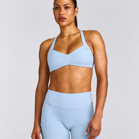 UnifiedMove™ T Back Minimal Bralette with Reflective Logo | Powdered Blue