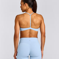 UnifiedMove™ T Back Minimal Bralette with Reflective Logo | Powdered Blue