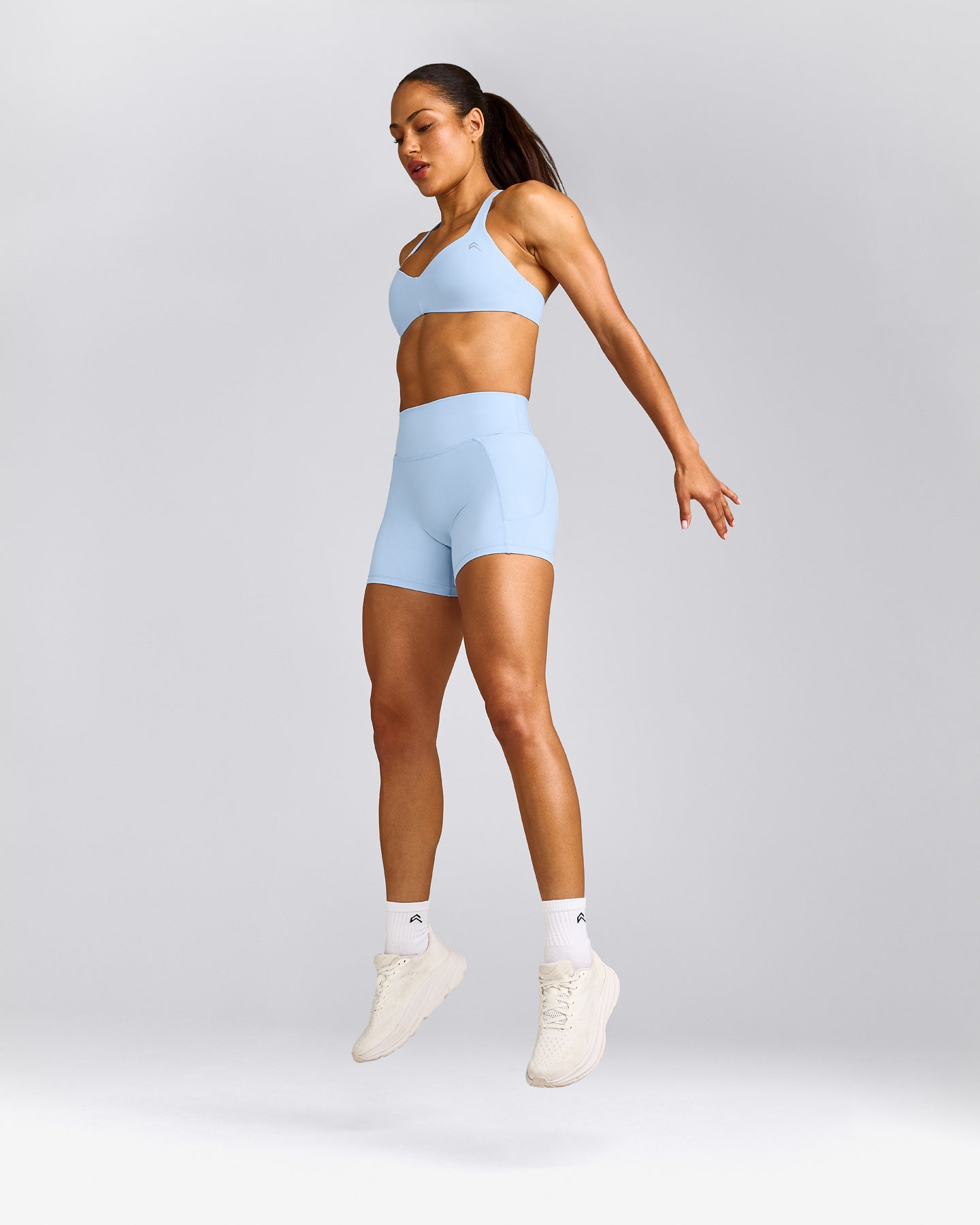 UnifiedMove™ T Back Minimal Bralette with Reflective Logo | Powdered Blue