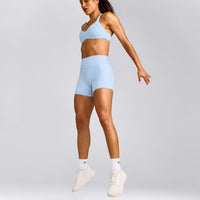 UnifiedMove™ T Back Minimal Bralette with Reflective Logo | Powdered Blue