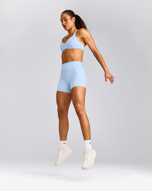UnifiedMove™ T Back Minimal Bralette with Reflective Logo | Powdered Blue