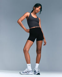 SoftMotion™ Racer Back Mid Vest with Built in Bra Shelf with Grey Logo | Coal