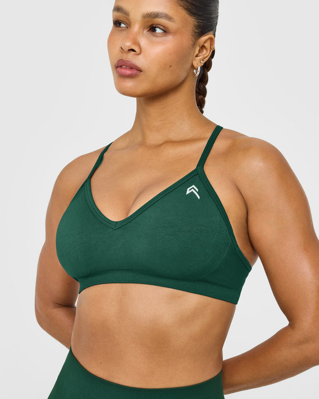 EnhanceLift™ Seamless Strappy Sports Bra with White Logo | Racing Green