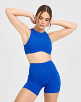 SoftMotion™ High Neck Sports Bra with White Logo | Light Cobalt Blue