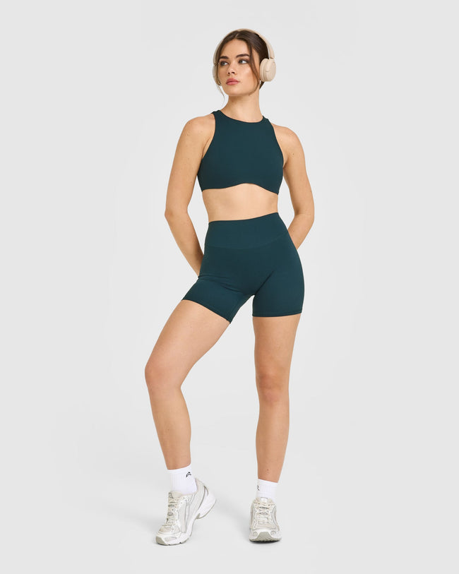 SoftMotion™ High Neck Sports Bra with White Logo | Oil Blue