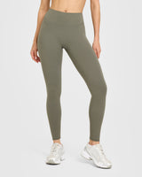 SoftMotion™ High Waisted Leggings with White Logo | Alpine Green