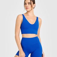 SoftMotion™ Longline Sports Bra with White Logo | Light Cobalt Blue