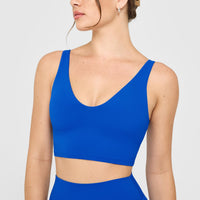 SoftMotion™ Longline Sports Bra with White Logo | Light Cobalt Blue
