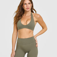 SoftMotion™ Minimal Halter Neck Bralette with White Logo | Alpine Green