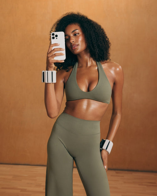 SoftMotion™ Minimal Halter Neck Bralette with White Logo | Alpine Green