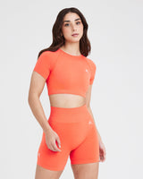 Effortless Seamless Short Sleeve Crop Top with White Logo | Peach Blossom