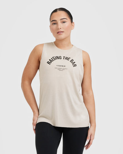 Raising The Bar Graphic Unisex Muscle Vest | Sand